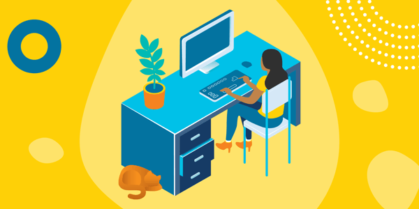 A woman sitting at a computer receiving a live coaching session online