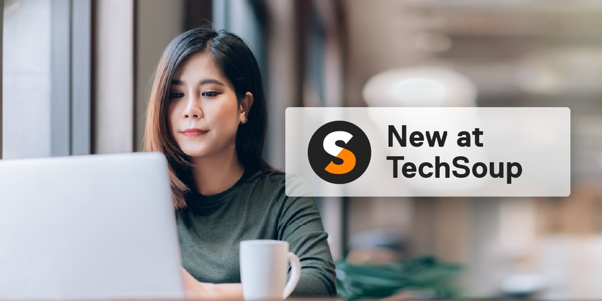 Person working at a laptop with a cup of coffee. Text bubble reads "New at TechSoup."