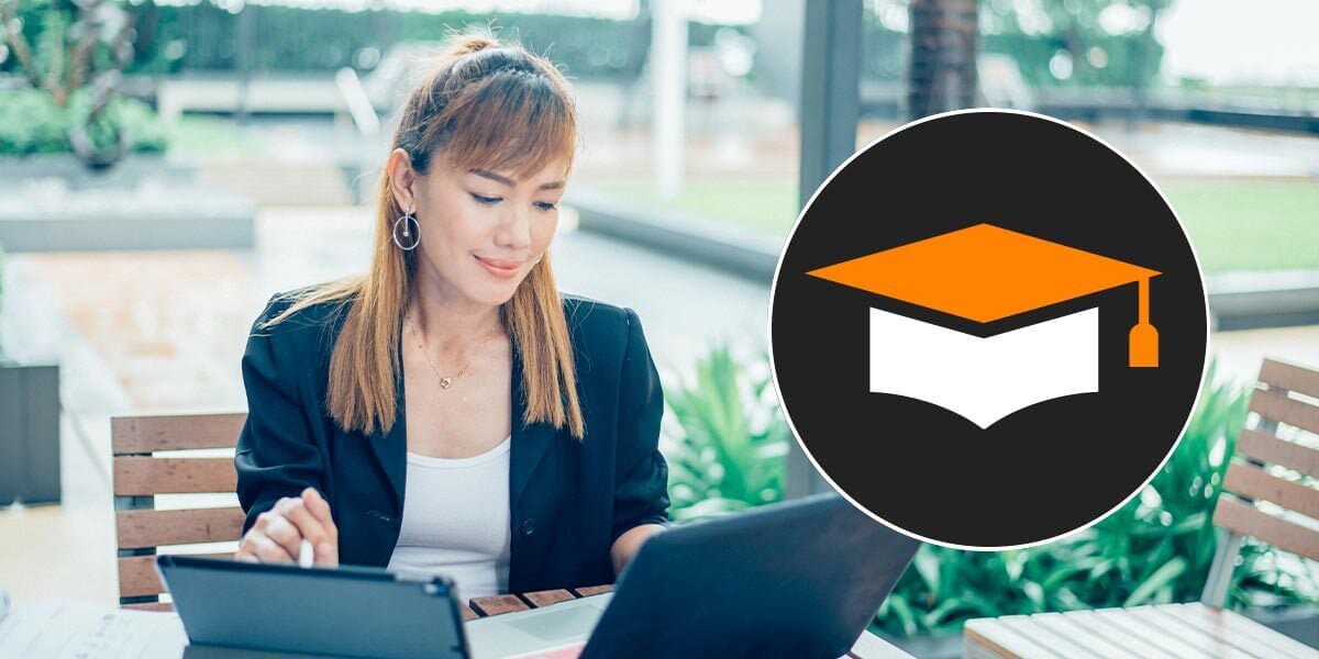 A person working with a laptop and a tablet in an outdoor plaza. The TechSoup Courses logo is inset.